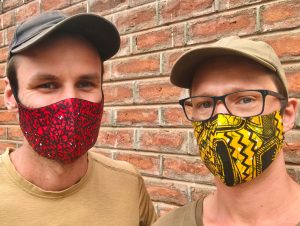 Hessel and Dilo wearing an African-style face mask