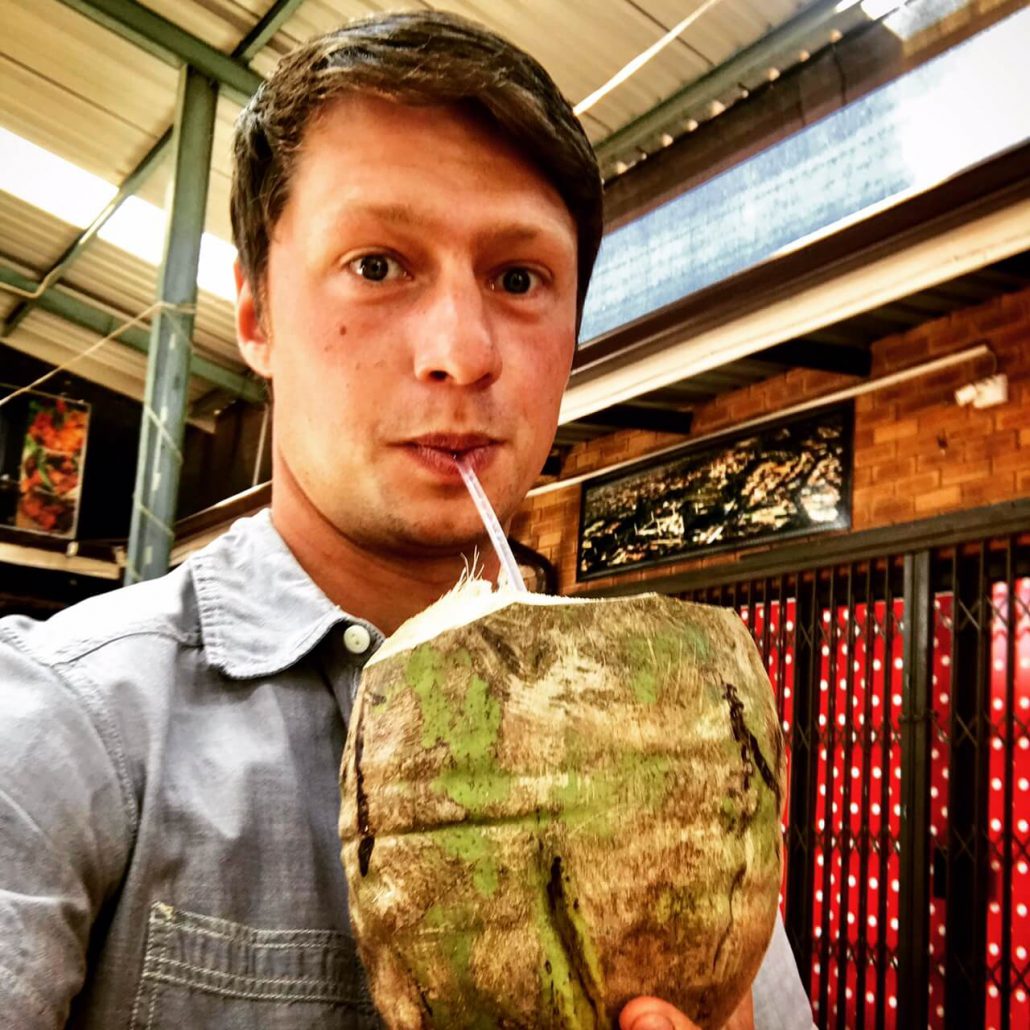 Dilo drinking form a coconut