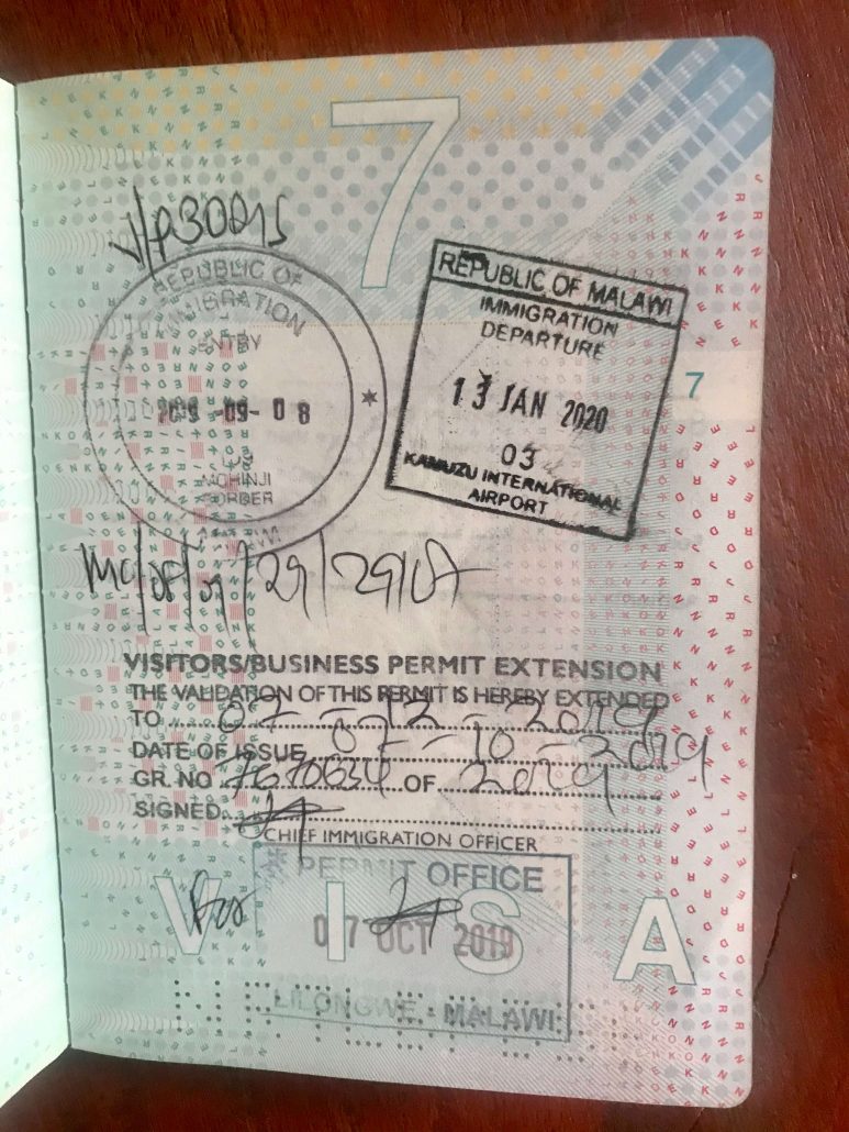 Passport with stamps of visa for Malawi