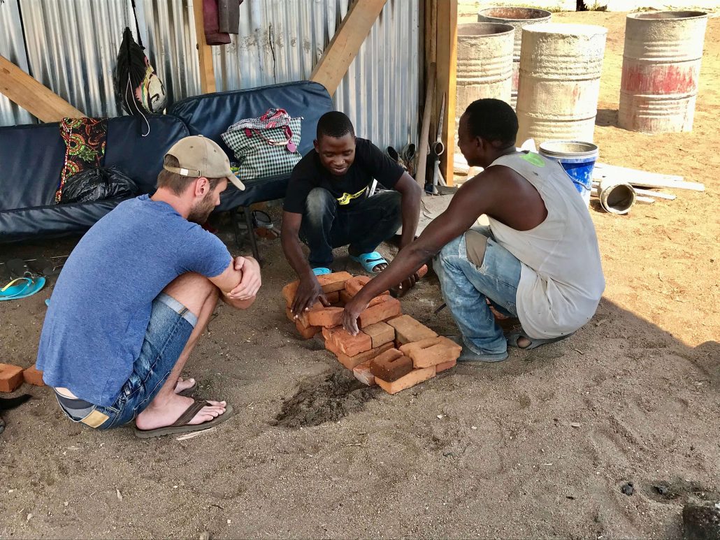 Hessel talking with Malawians