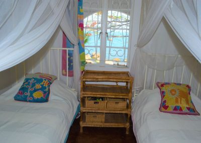 Single beds in Kuwona Cottage, at Senga Bay on Lake Malawi