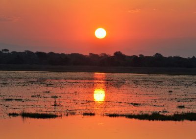 Zonsondergang bij Kuti Wildlife Reserve in Malawi